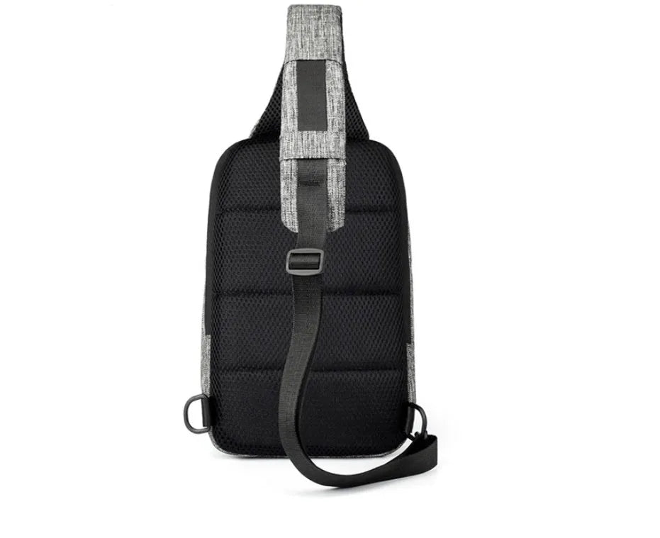 Dark blue Oxford cloth waterproof chest bag with zip and adjustable strap, shown on a person's chest.
