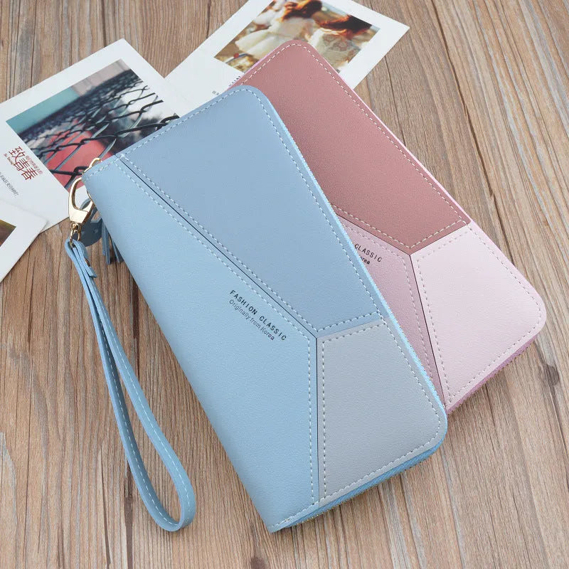 Women's long zipper tassel clutch bag with stitching detail in Black, Blue or Pink, horizontal square shape.