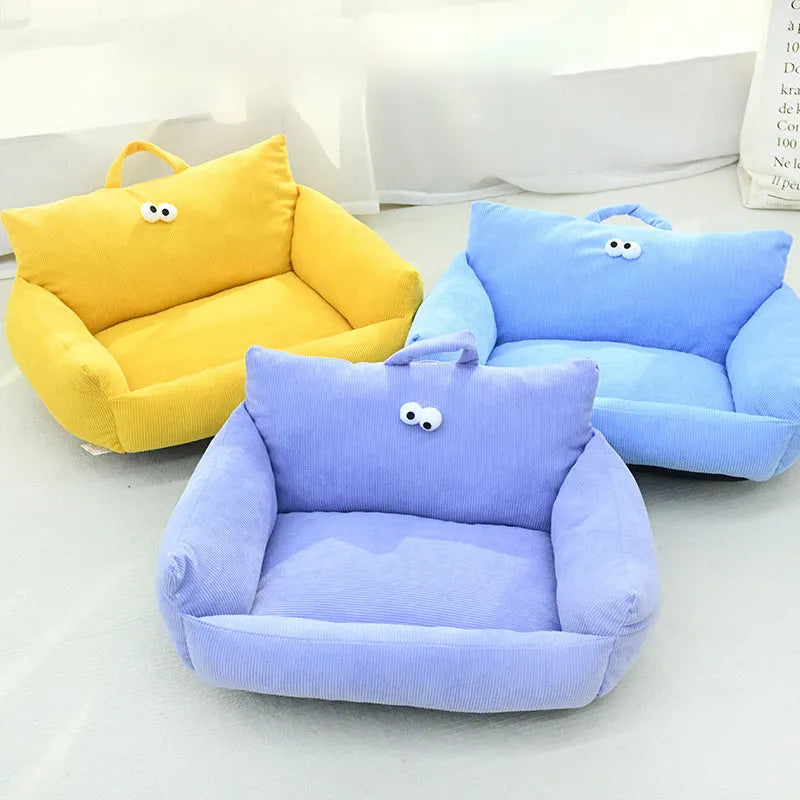 Blue cartoon big eye pet nest bed for small dog or cat on a sofa