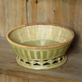 Handmade woven bamboo storage basket in three sizes for household organisation