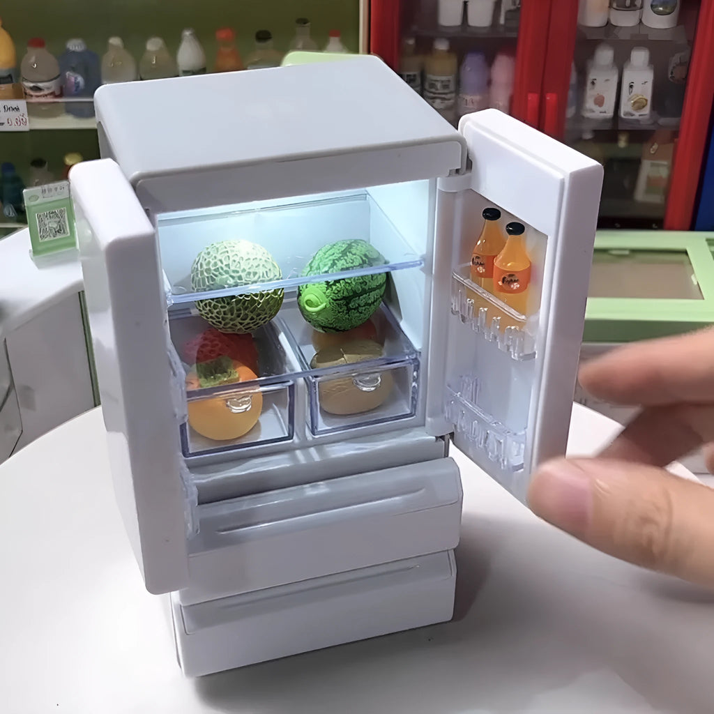 White plastic miniature toy model with internal LED lighting turned on, showing detailed structure.