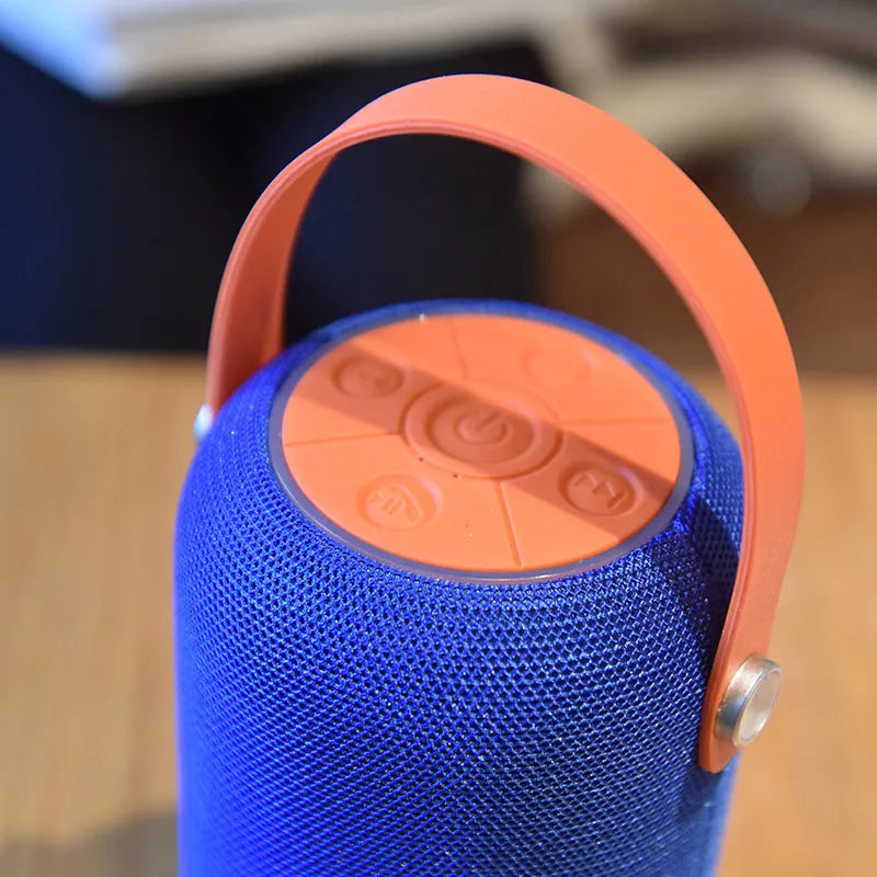 TG107 fabric Bluetooth portable speaker in blue colour with front relief spinning wheel design