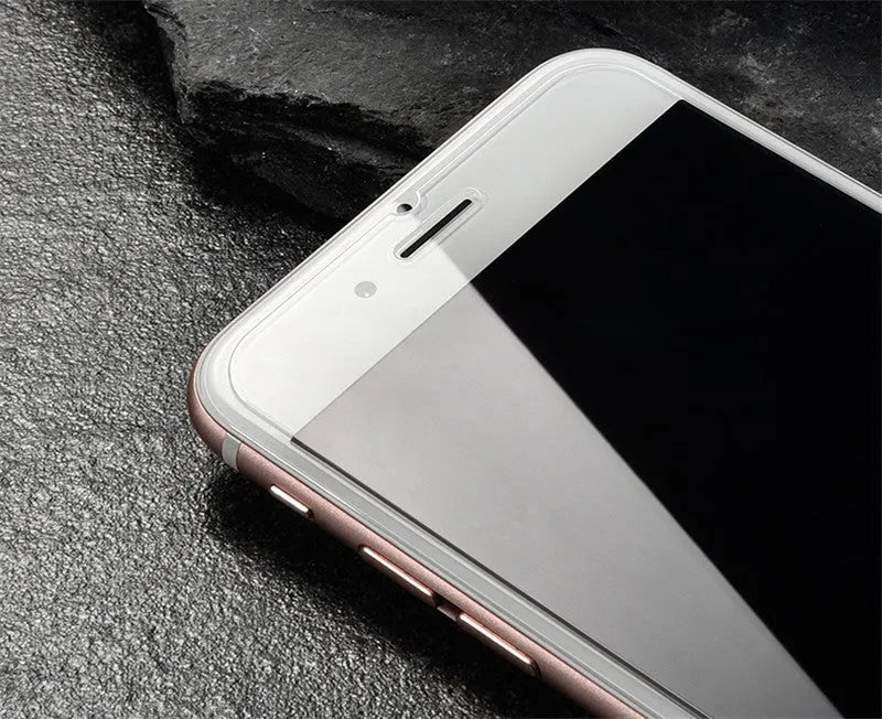 Tempered glass screen protector for mobile phone with 9H hardness and oleophobic coating.
