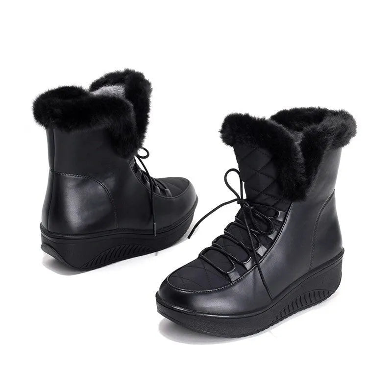 Black women's ankle winter boots with lace-up front, platform sole, and plush lining.