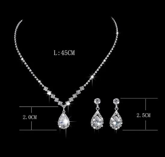 Silver alloy water drop zircon pendant necklace with rhinestone accents and matching earrings two piece set
