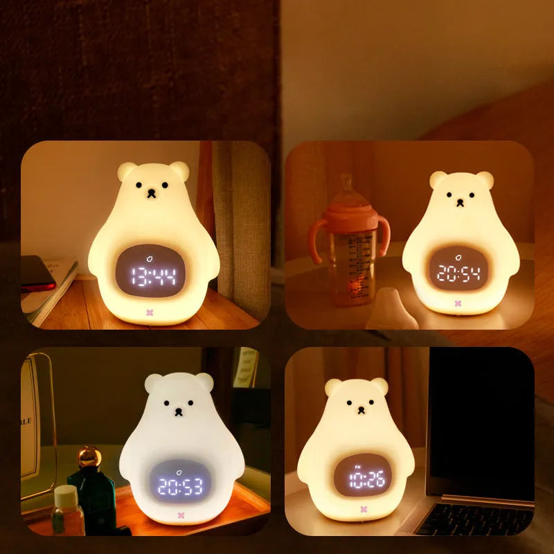 White silicone bear-shaped night light with remote control on a wooden bedside table.