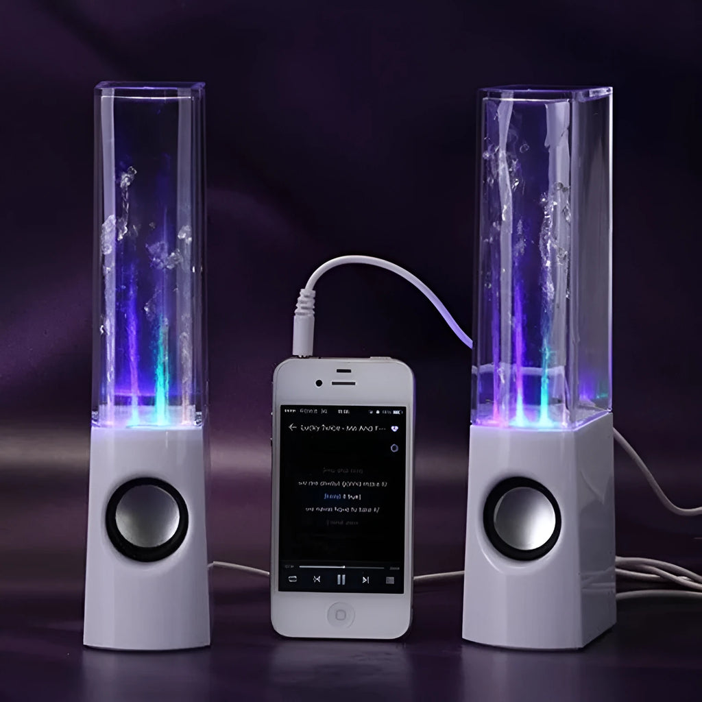 Wireless dancing water speaker with LED light fountain showing colourful water column and dual speakers on a desk