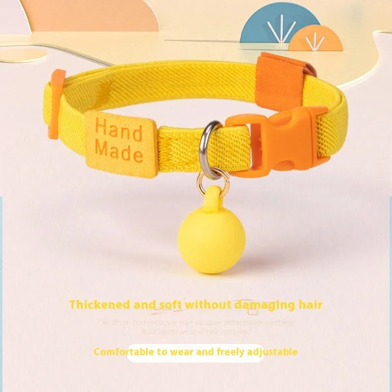 Small dog collar made of elastic polyester webbing with a plastic buckle, shown in a monochrome colour.