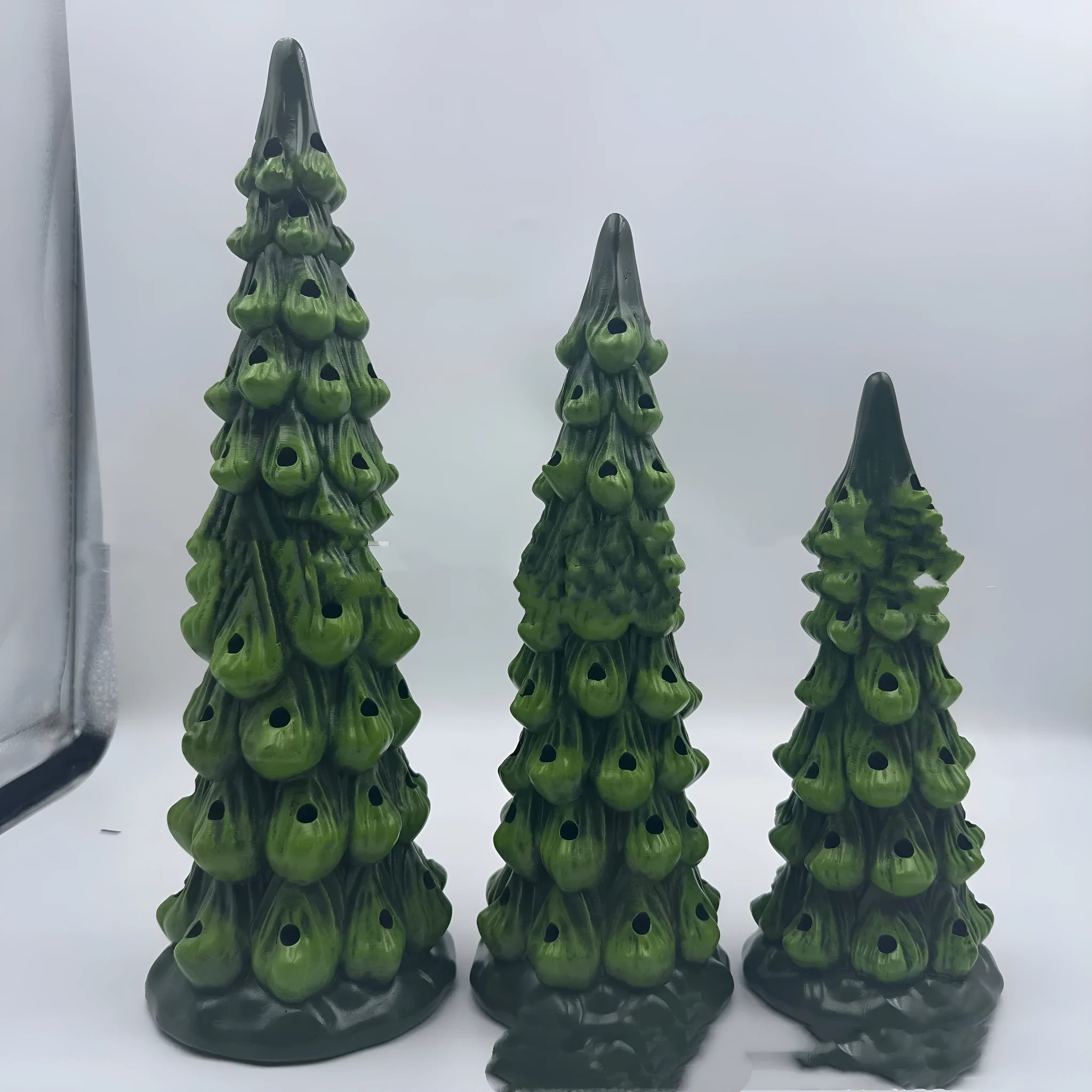 A resin Christmas tree light decoration in European style, showing coloured light option.