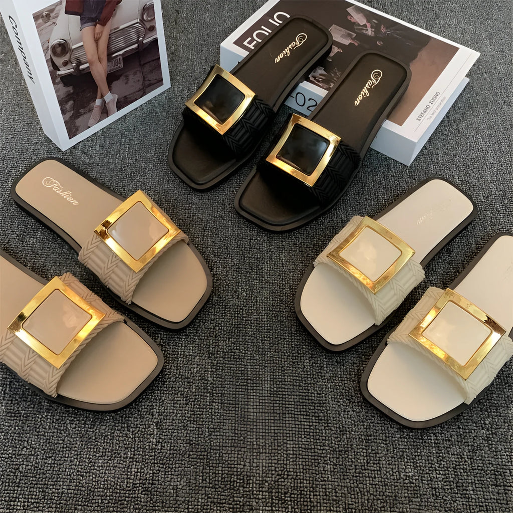 Women's apricot coloured flat summer slippers with a textured PVC sole.