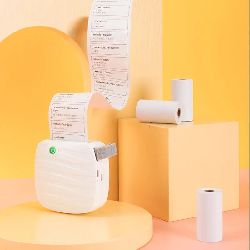 A box containing three rolls of white 57mm wide thermal paper for printers.