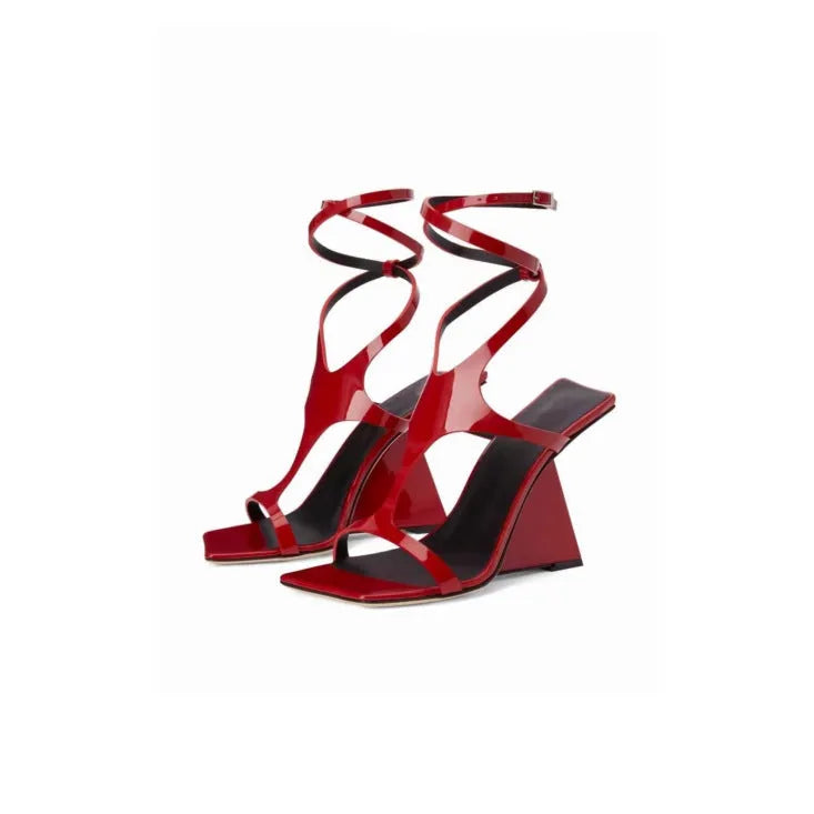 Women's black square-toe high heel sandals with a block heel and button fastening.