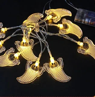 Halloween pumpkin and ghost LED string lights with battery pack and multiple pendant designs