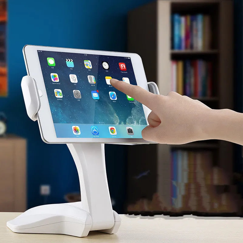 White foldable universal tablet stand with adjustable clamp extended, holding a tablet.