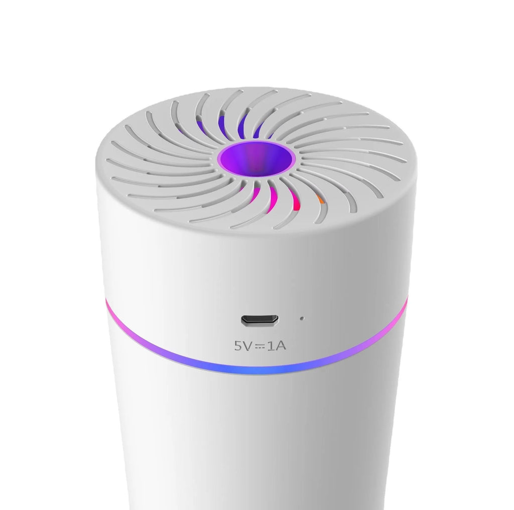 A compact white USB car humidifier for aromatherapy and air humidifying, shown with a power cable.