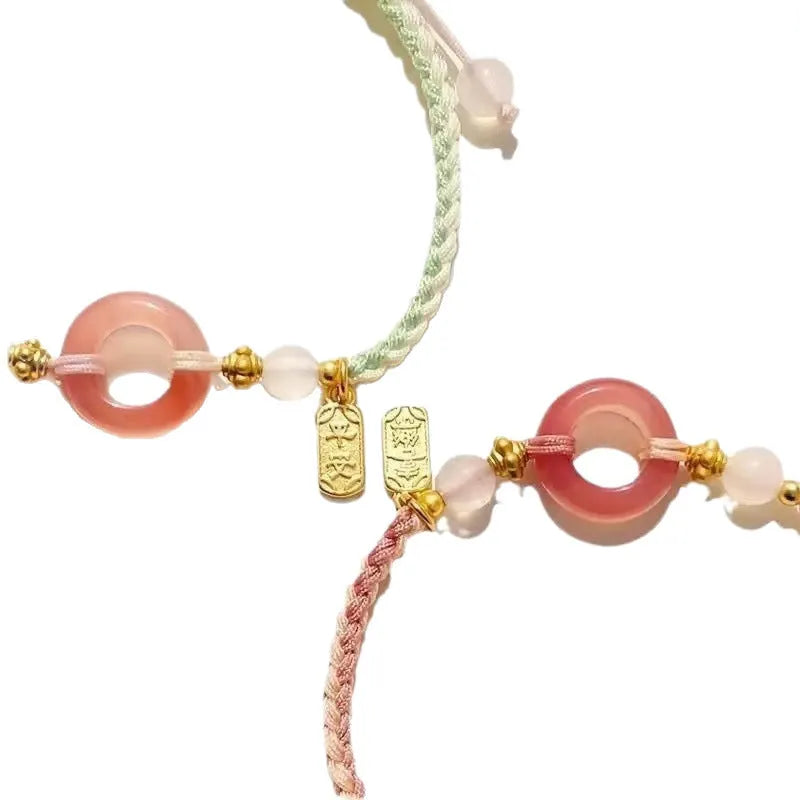 DIY woven watch band with national style minority design featuring peach blossom pattern in black, green and pink colour options