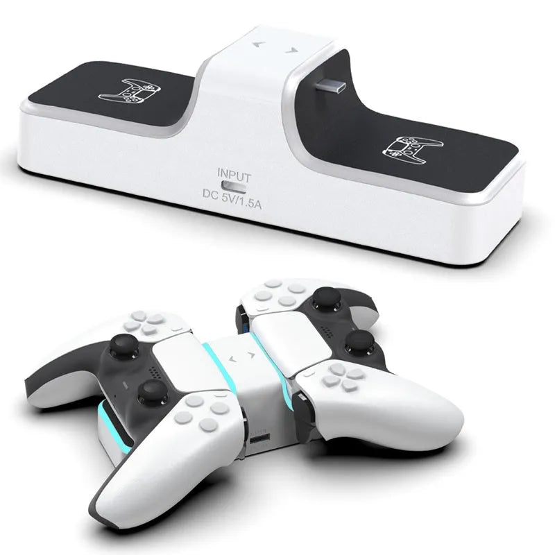 White PS5 dual controller charging station with red and blue LED indicators on a desk