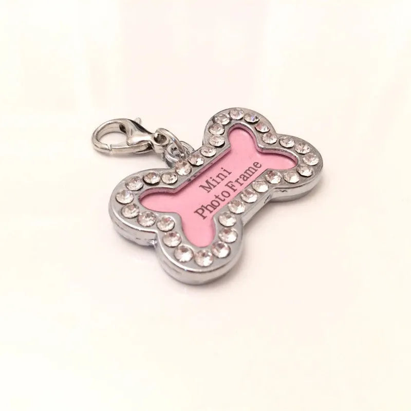 Metal diamond dog pendant necklace with pink bone pattern on a pet collar