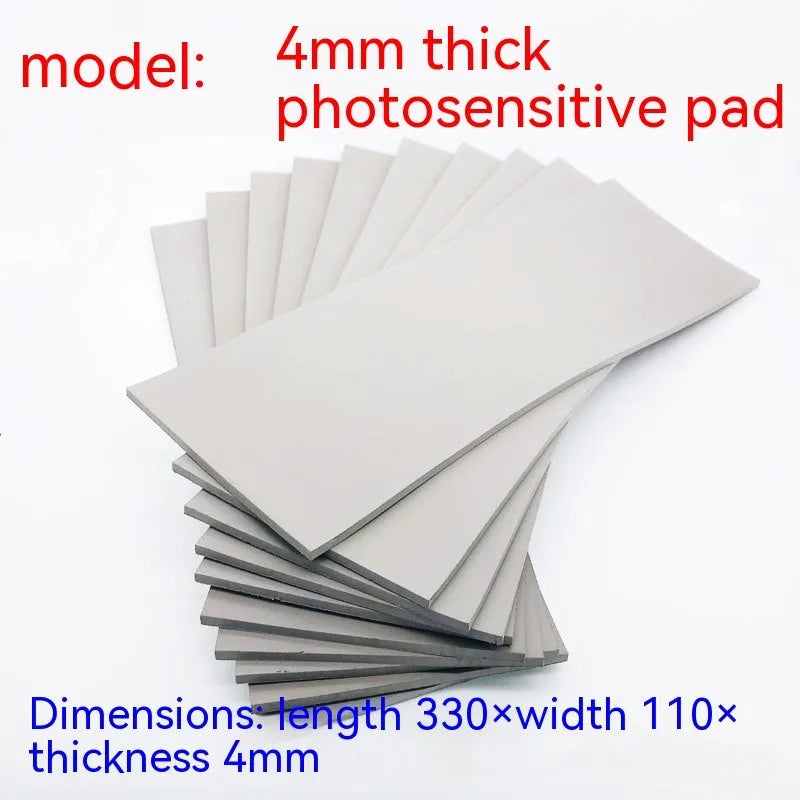 Black and grey plastic photosensitive mat for seal making in pottery and calligraphy.