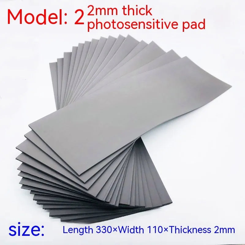 Black and grey plastic photosensitive mat for seal making in pottery and calligraphy.