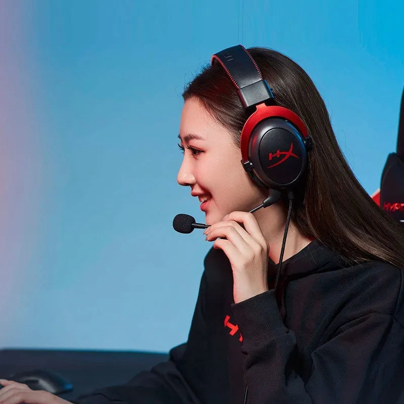 Hurricane 2 wired over-ear gaming headset in black and red, showing detachable microphone and USB sound card remote.