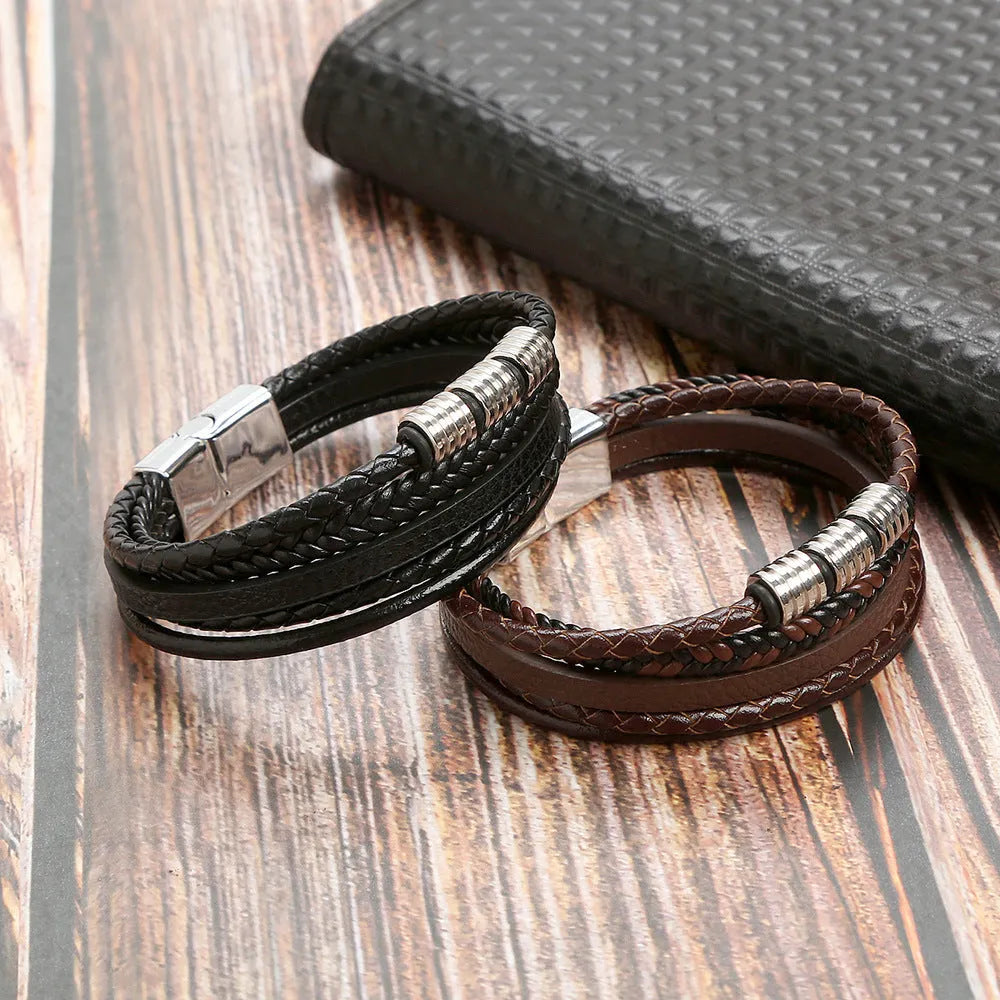 Men's woven leather bracelet with alloy magnetic buckle, geometric design, electroplated finish, in black or brown.