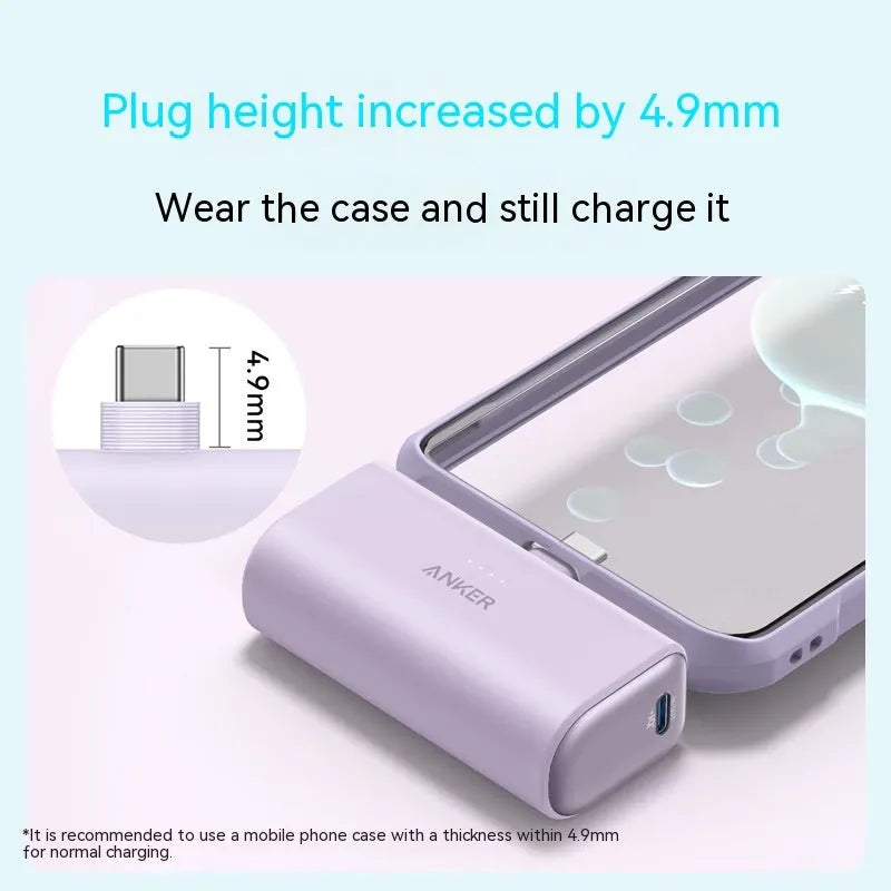 Small capsule-shaped power bank in multiple colours showing USB-C port and compact size.