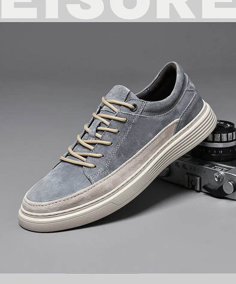 Men's grey and sand casual leather skate shoes with a round toe and rubber sole.