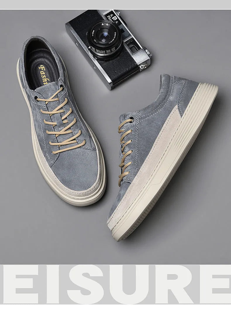 Men's grey and sand casual leather skate shoes with a round toe and rubber sole.