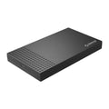 Black ABS plastic 25-inch Type-C hard disk box with cables on a flat surface