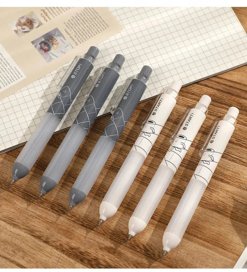 Two 0.5mm mechanical pencils with soft cloud grips, one black and one white, on a plain background.