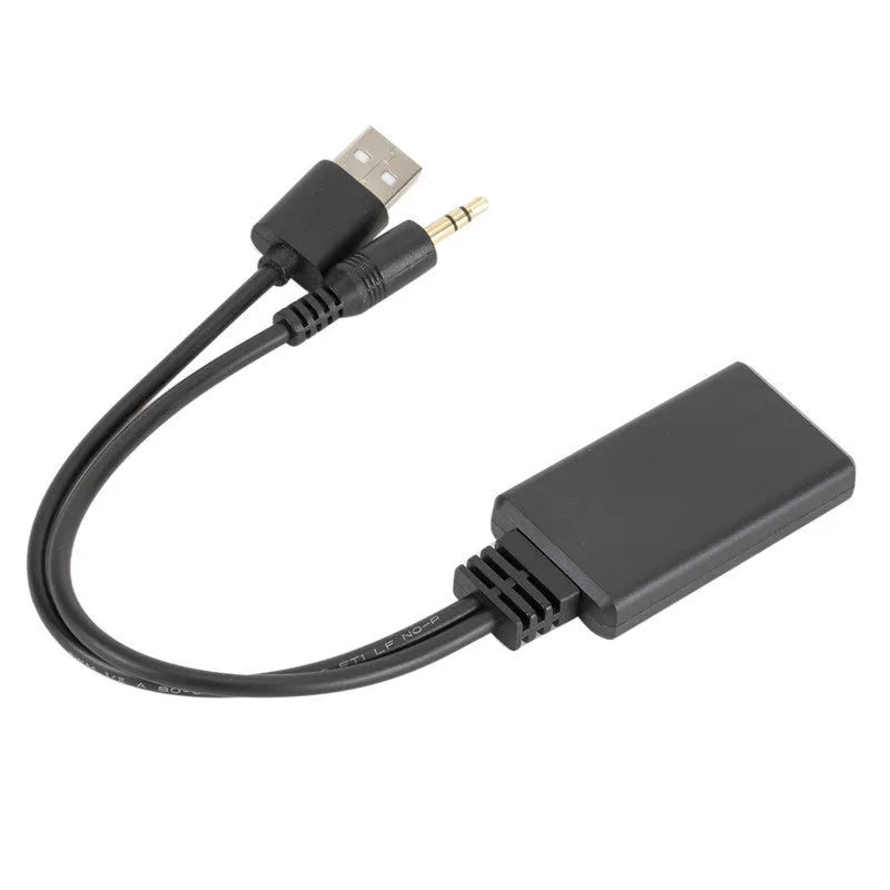 Black Car AUX Bluetooth Audio Receiver with USB and 3.5mm jack ports.