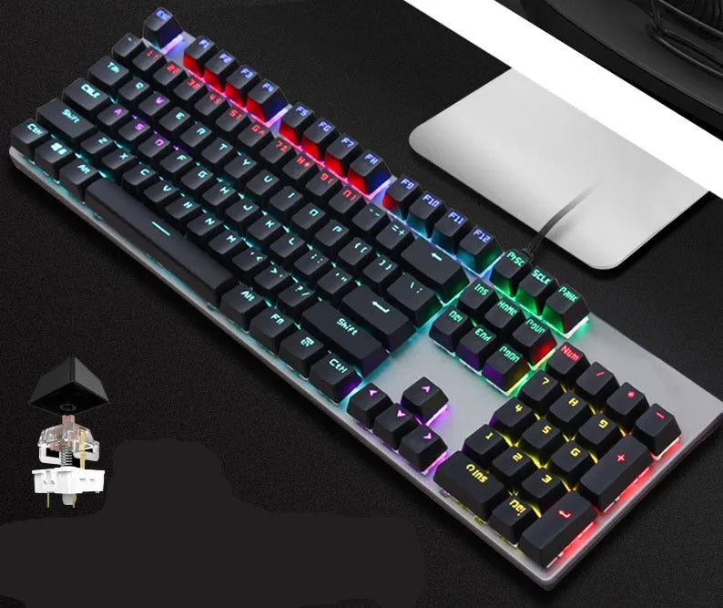 AOC GK410 wired mechanical keyboard with metal top plate and green switch keys on a desk.