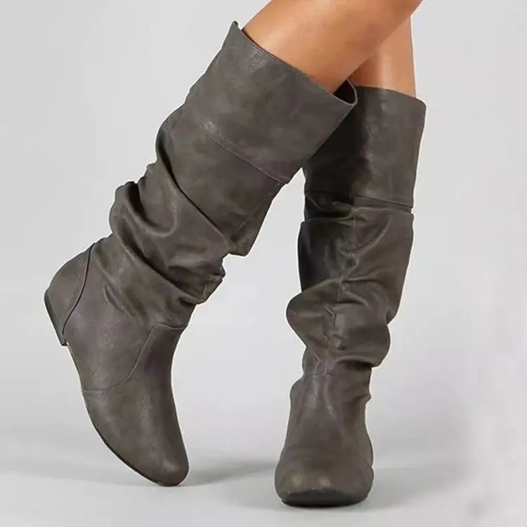 Women's black flat slip-on ankle boots with round toe and high cylinder shaft