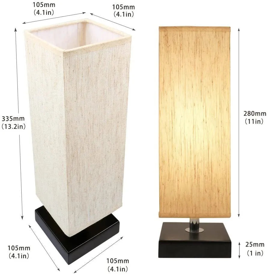 Modern simple square cloth covered table lamp 110V with E26 socket and off-white fabric shade on a desk
