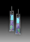 Silver coloured women's earrings with an irregular water drop shape made from alloy.