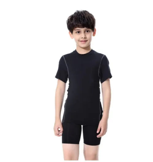 Children's sportswear set with polyester spandex athletic clothing in black and green colours