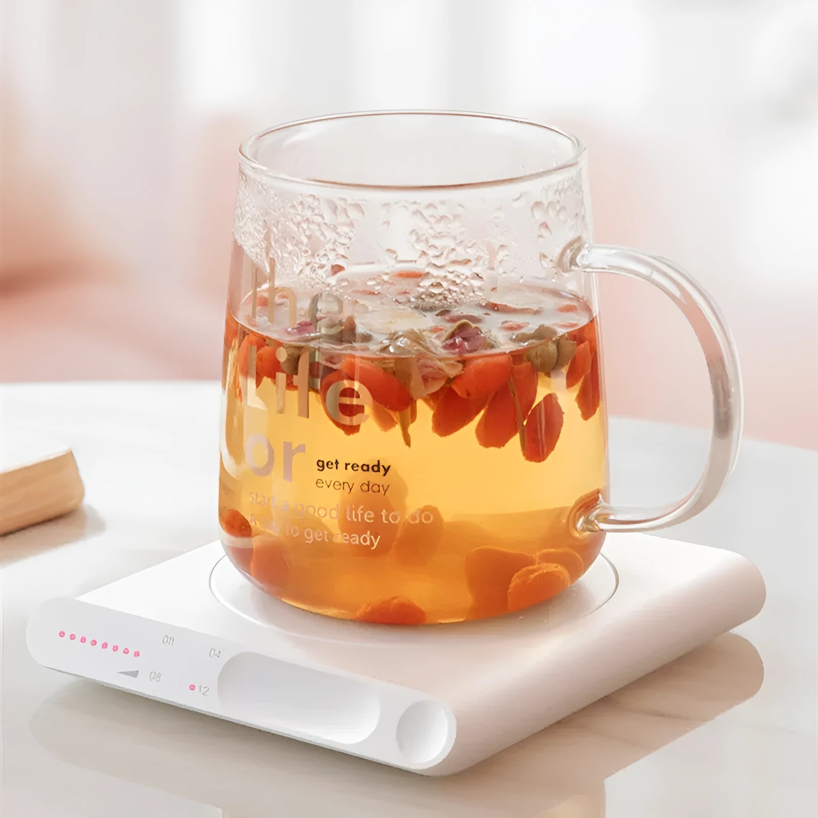 USB-powered heating cup coaster pad with mechanical timer in pink and white colour options