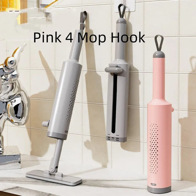 Pink rotatable self-squeeze mini flat mop with microfiber pad and sliding rod mechanism