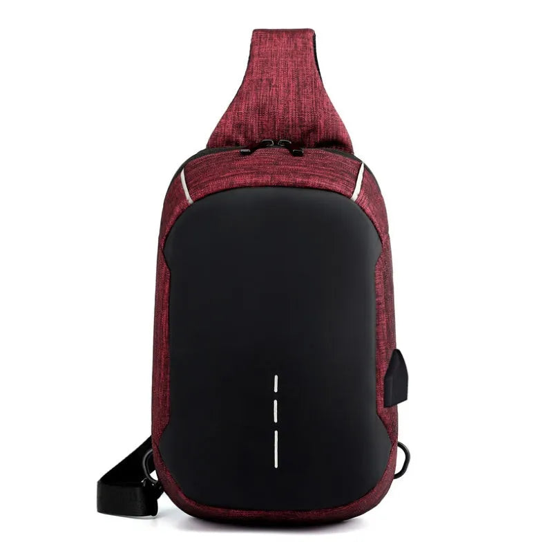 Dark blue Oxford cloth waterproof chest bag with zip and adjustable strap, shown on a person's chest.