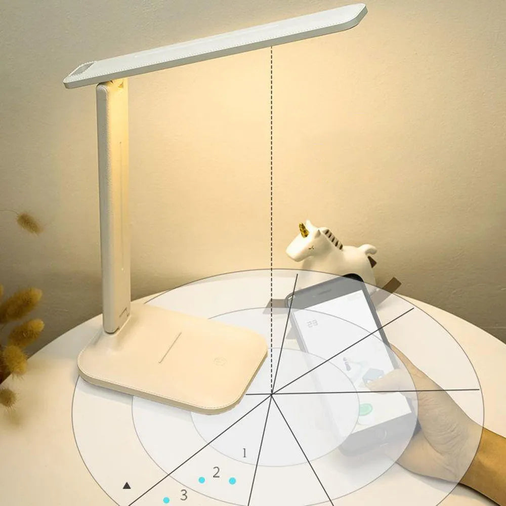 White plastic bedside lamp with touch dimming and USB charging port.