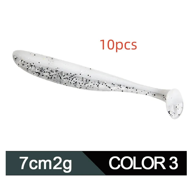 Two-tone soft plastic T-tail fishing lure measuring 7cm, shown in multiple colour variations.