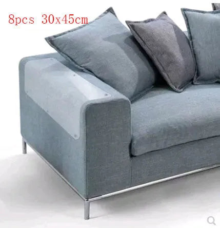 Two transparent PVC self-adhesive cat claw protector pads on a leather sofa arm, each 47x15cm