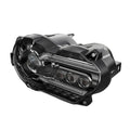 Black LED motorcycle headlight unit showing front lens and shell, with scale showing dimensions.