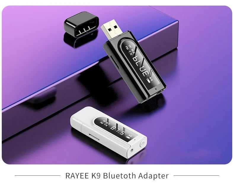 Black USB car Bluetooth receiver with AUX output port for wireless music streaming to car stereo.