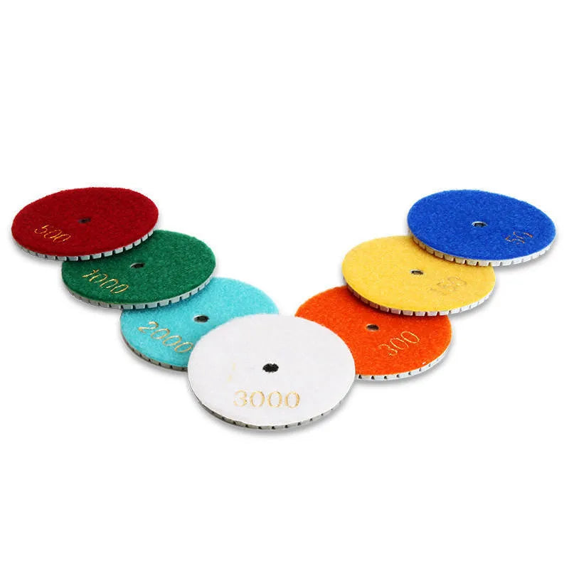 Set of 10 emery stone polishing pads with 80mm diameter and grits from 50 to 3000 mesh.