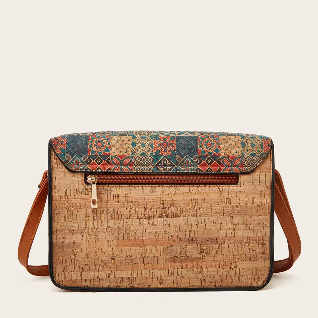Women's printed PU crossbody bag in pansy pattern with single shoulder strap.