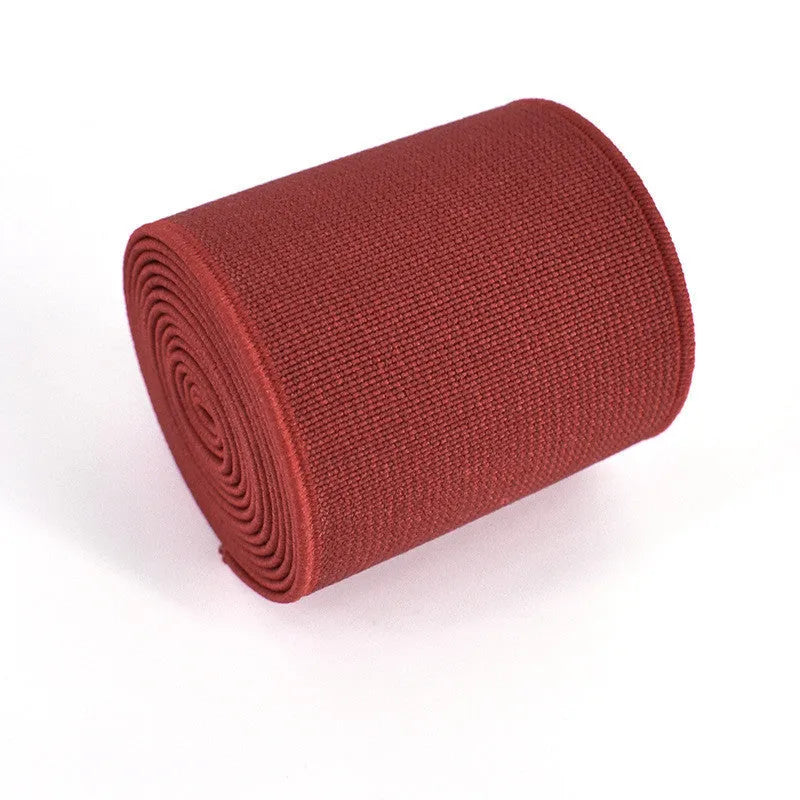 5cm wide rubber elastic band in multiple colours showing 1.5mm thickness for clothing and luggage use