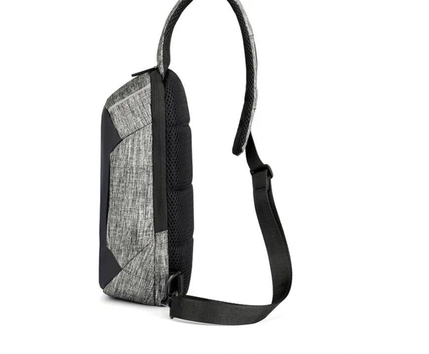 Dark blue Oxford cloth waterproof chest bag with zip and adjustable strap, shown on a person's chest.