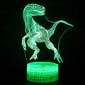 Colourful dinosaur 3D LED night light with touch controls on a compact ABS base.